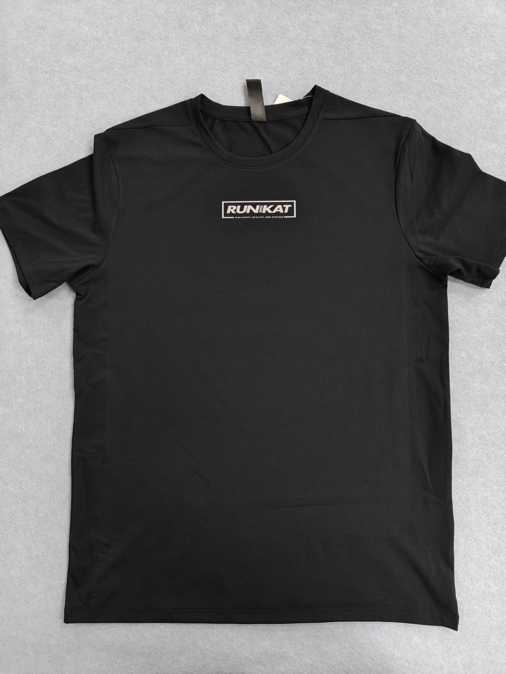 Run With Kat Roots Performance Tee (Men’s)